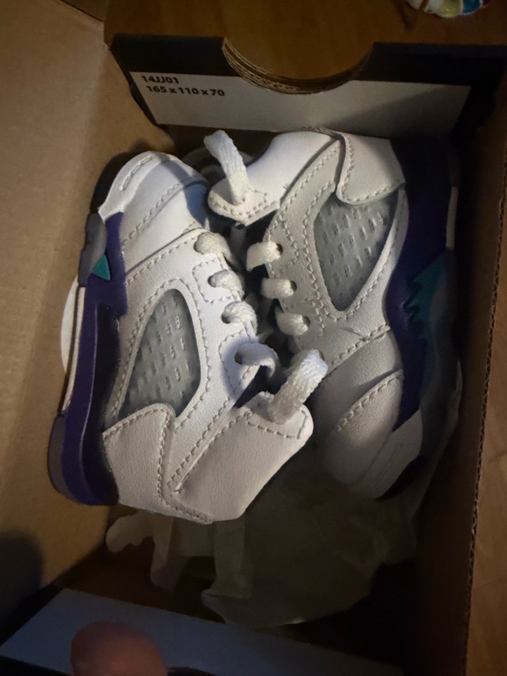 Nike Kids White Sneakers with Purple and Teal Accents